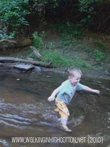 wyatt playing @ river july 2010 (picnik) (text) wyatt playing %40 river july 2010 picnik text