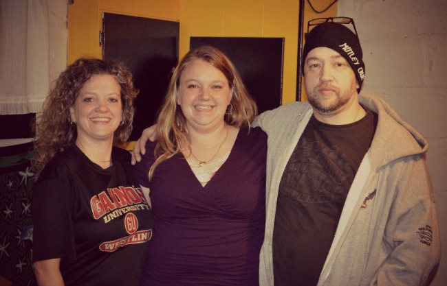 That's me, in the middle, with my momma's younger brother and sister, my Godparents.