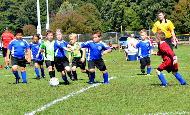 He's been goalie a few times now. (See the red shirt?)